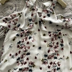 Beautiful printed cold shoulder top.
